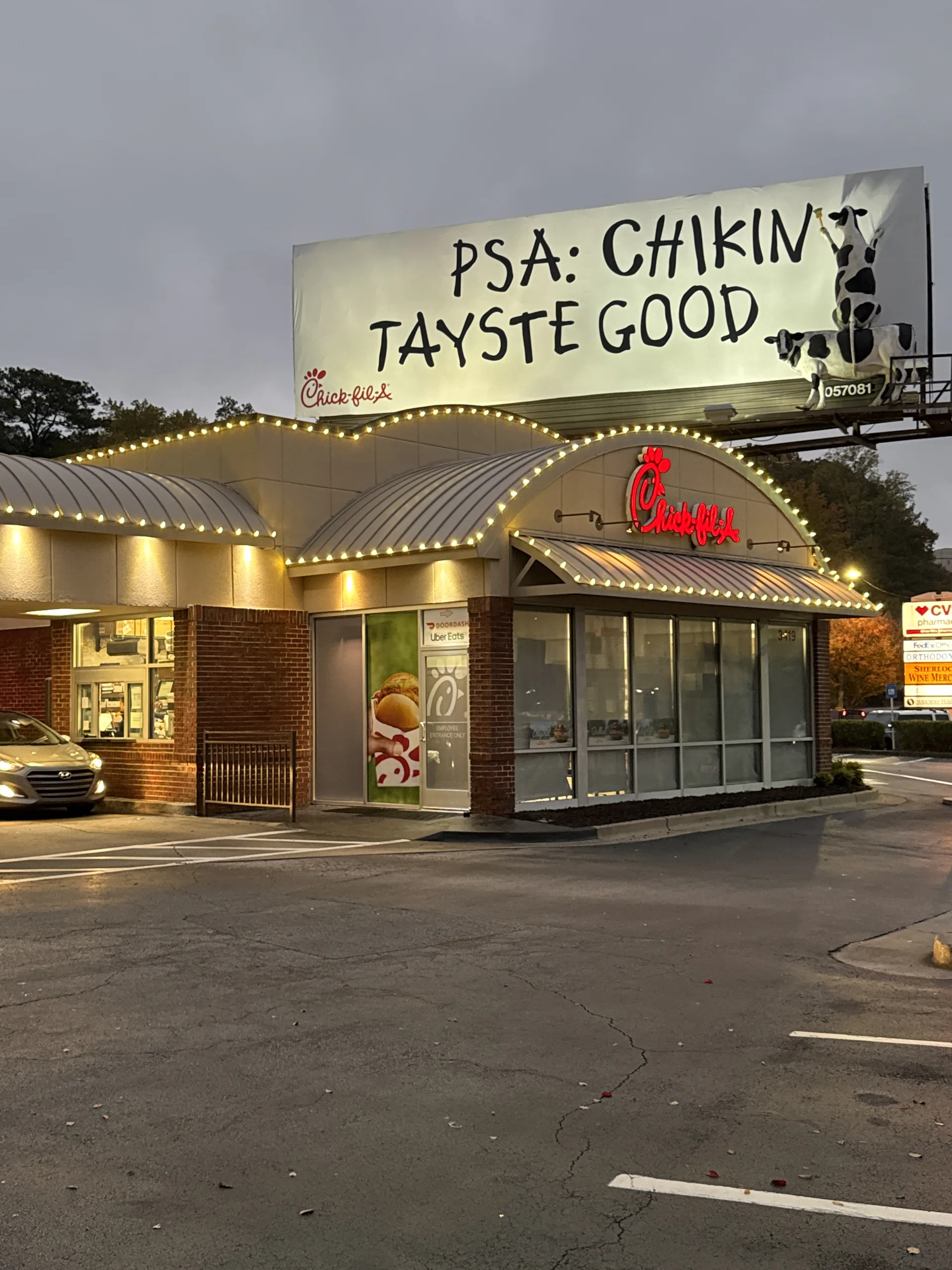 Commercial Christmas light installation at Chick-fil-A in Atlanta