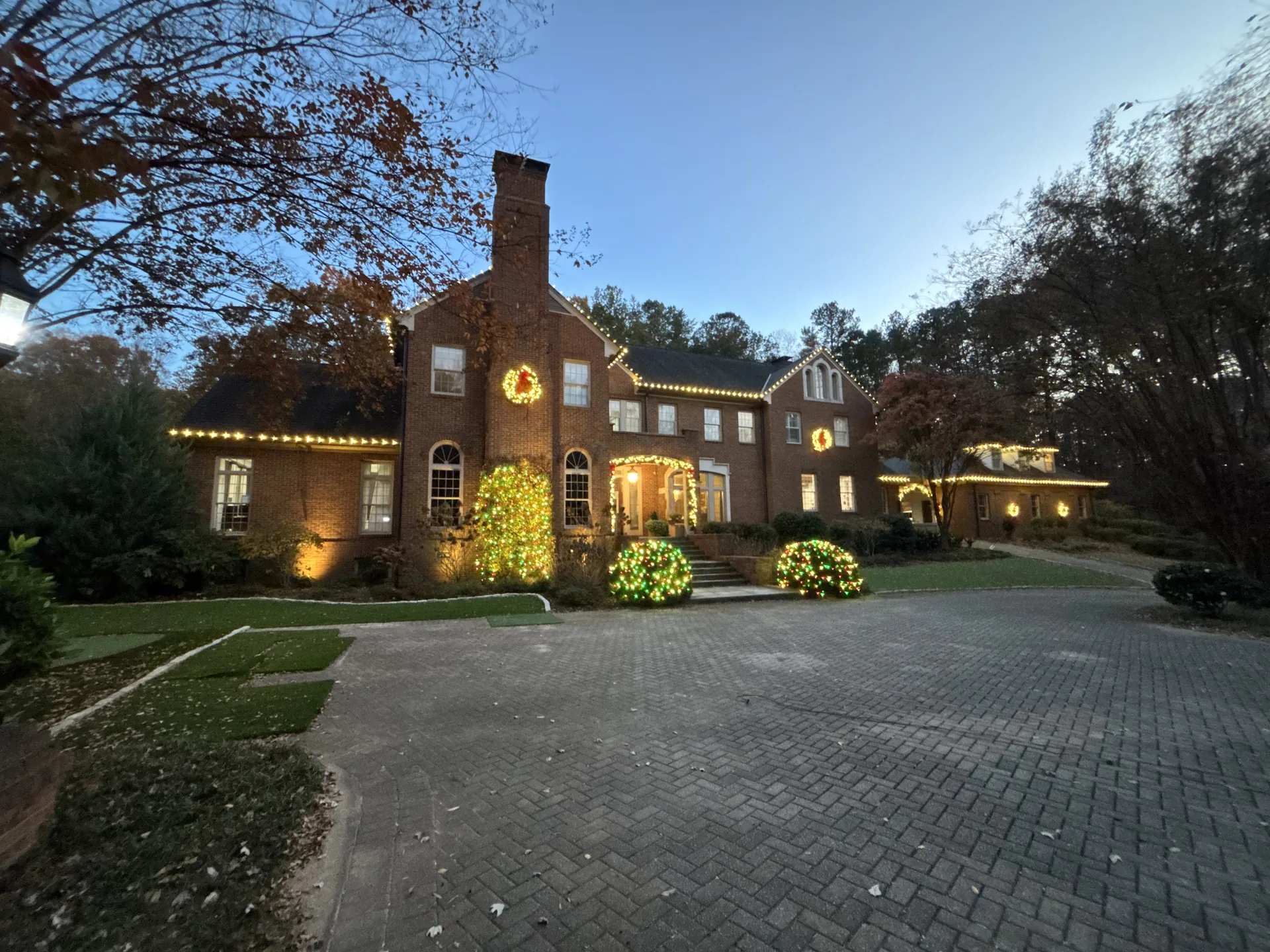 Christmas light installation on a Sandy Springs home